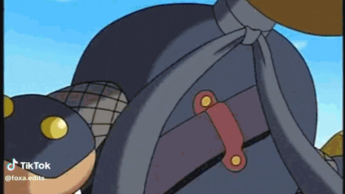 a close up of a cartoon character 's back with a sword in it .