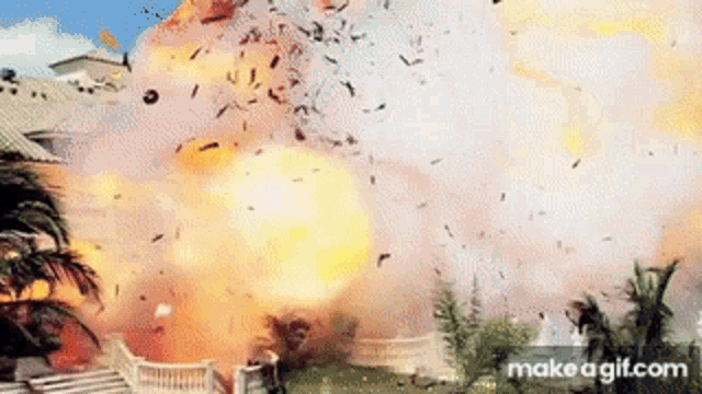a large explosion is taking place in a backyard