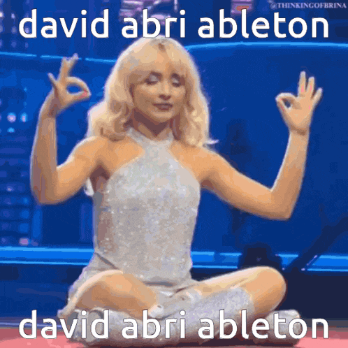 a woman in a white dress is sitting in a lotus position with the words david abri ableton behind her