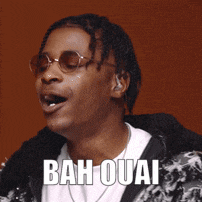 a man wearing sunglasses and a jacket with the words bah ouai on his face