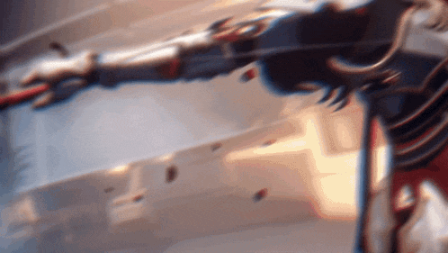 a blurry picture of a person with a sword in their hand