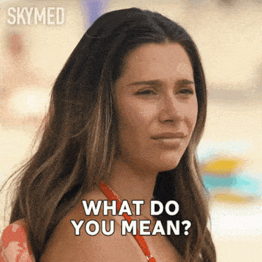 a woman says what do you mean in a gif