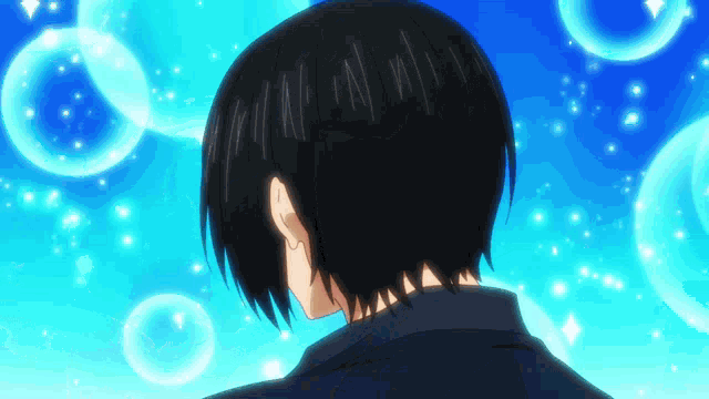 the back of a person 's head with a blue background