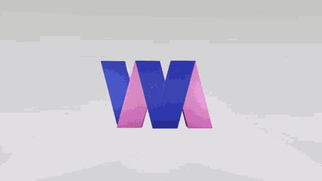 a blue and pink letter w is on a white background