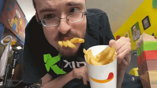 Chewing Fries Ricky Berwick GIF - Chewing Fries Ricky Berwick Ricky Berwick Vlog GIFs
