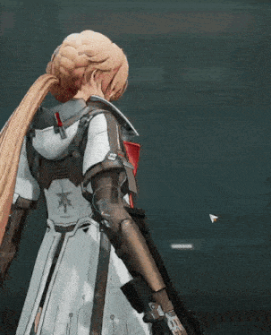 a woman with a ponytail is holding a gun