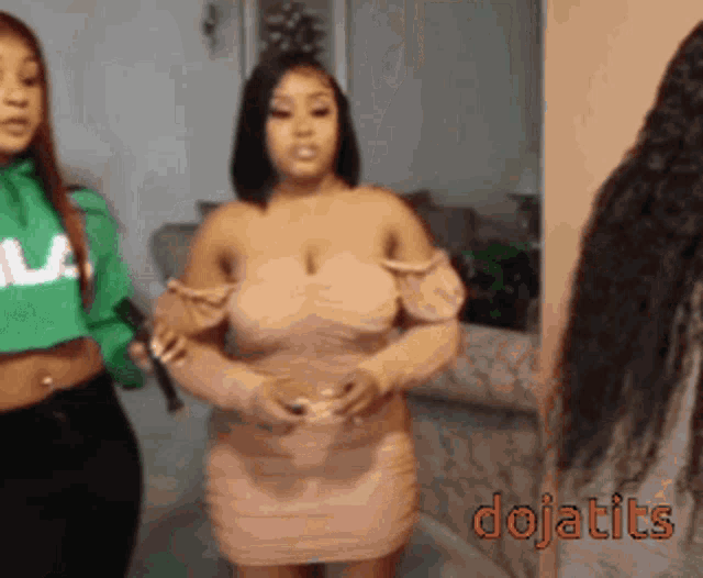 two women standing next to each other with the word dojatits on the bottom
