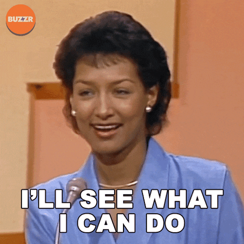 a woman says " i 'll see what i can do " while speaking into a microphone