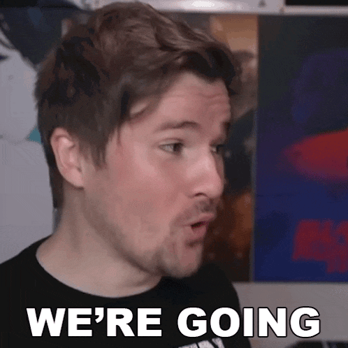 a man with a beard is making a funny face and saying we 're going