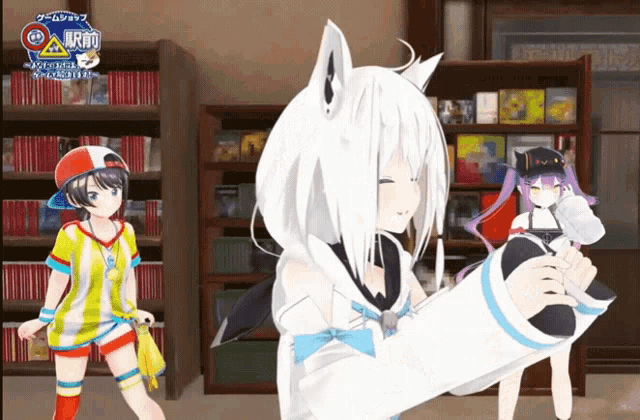 three anime girls are standing in front of a bookshelf with a sign that says ' a ' on it