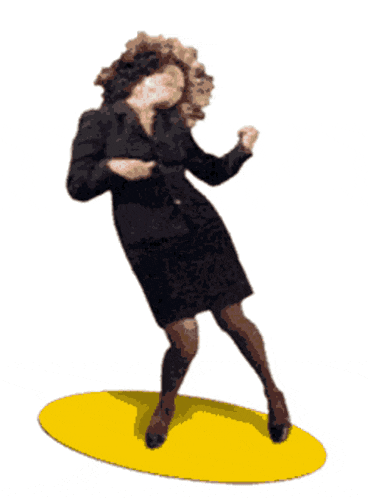 a woman in a black dress is standing on a yellow circle
