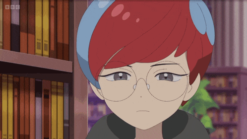 a girl with red hair and glasses stands in front of a bookshelf with bbc written on the bottom