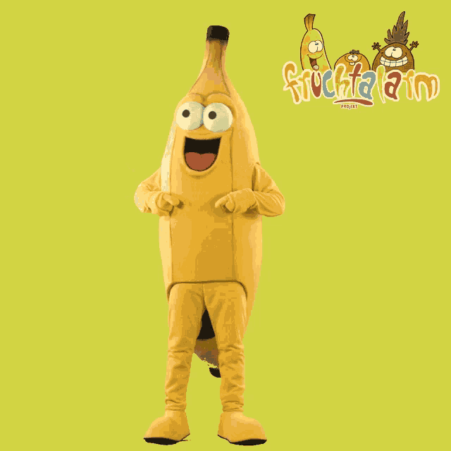 a mascot in a banana costume is standing in front of a yellow background that says fruitaland