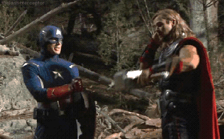 a captain america and thor are standing next to each other