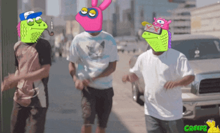a group of people are walking down a street and one of them has a cartoon face on it