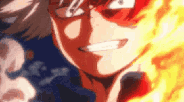 a close up of a person 's face with flames coming out of his eyes .