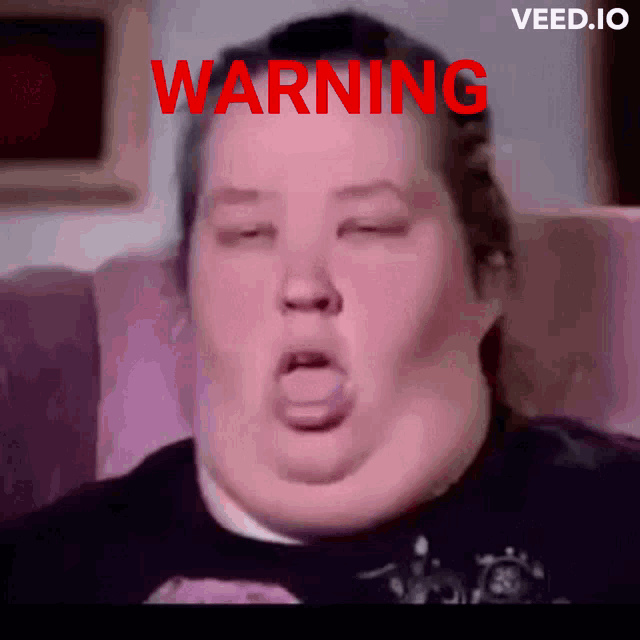 a woman with her eyes closed has the word warning written in red on her face