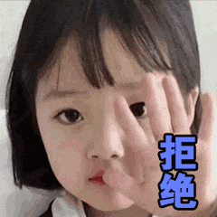 a little girl is covering her face with her hands and making a funny face .