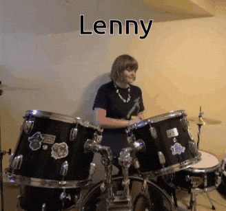 a woman is playing drums with the name lenny written above her