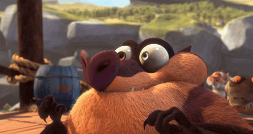 a close up of a cartoon character 's face with a barrel in the background