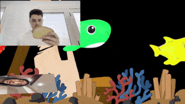 a man is holding a piece of bread in front of a green fish
