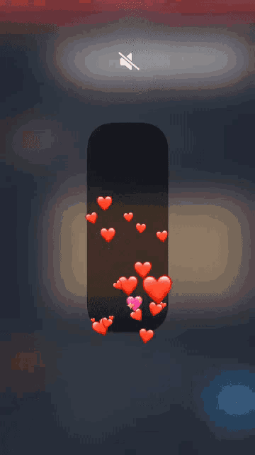 a phone screen with red hearts on it and a silence button