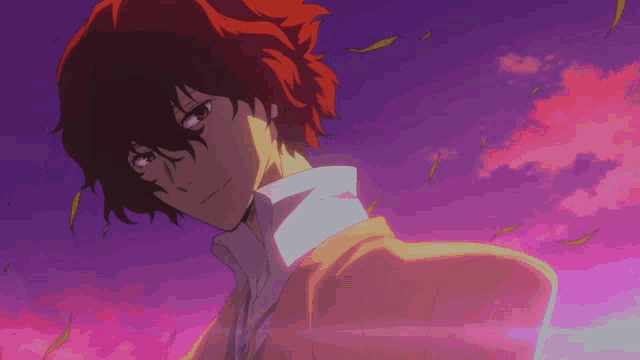 a man with red hair stands in front of a pink and purple sky