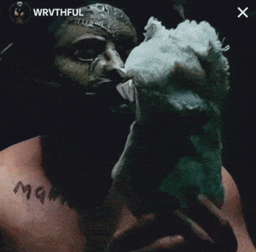 a picture of a man with a mask on his face and the words good night written on his chest