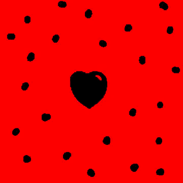 a green heart with black dots on it on a black background