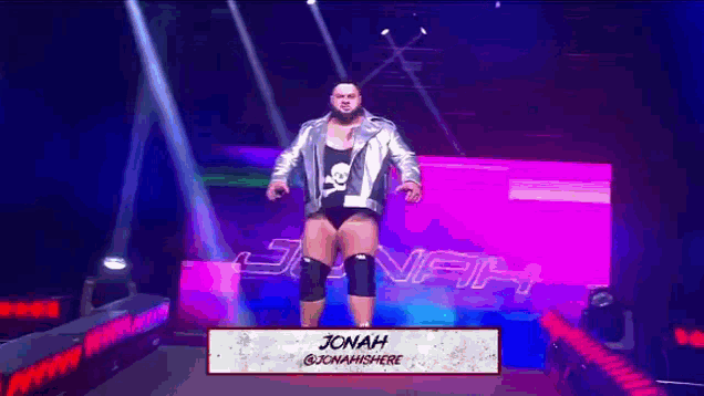 a wrestler named jonah is on a stage