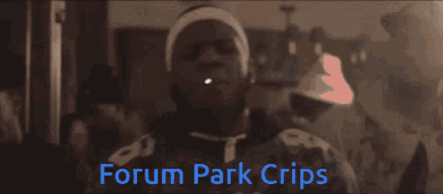 a blurred image of a man with the words forum park crips written below him
