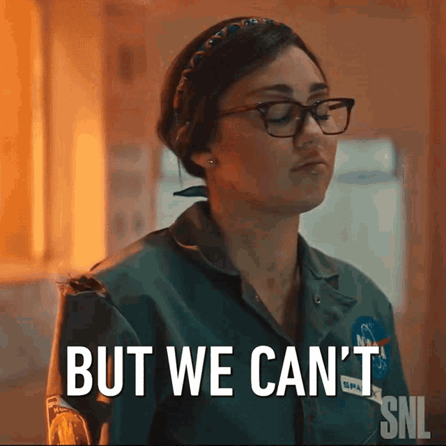 a woman with glasses and a nasa jacket says but we can 't