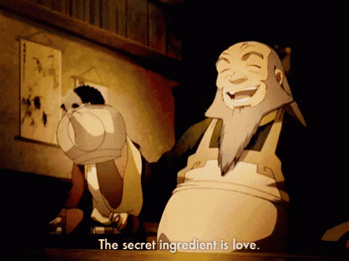 a man with a beard is laughing with the words the secret ingredient is love below him