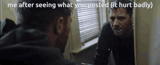 a man is looking at himself in a mirror with the caption " me after seeing what you posted it hurt badly "