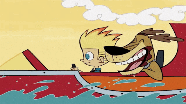 a boy and a dog are riding a boat in the water