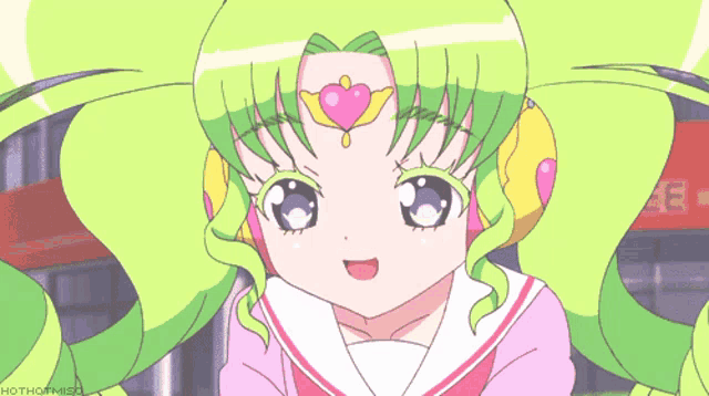 a girl with green hair and a pink heart on her head