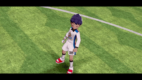 a boy with the number 109 on his shorts stands on a soccer field