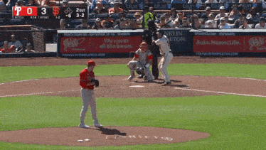a baseball game is being played with a score of 0-3