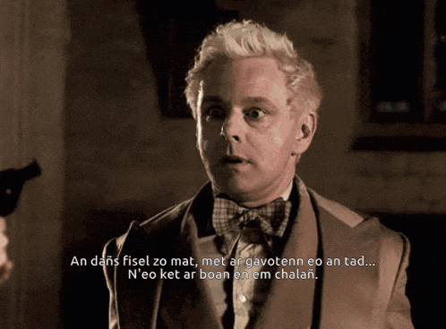 a man in a suit and bow tie says " an dans fisel zo mat met ar gavottenn eo an tad ... "