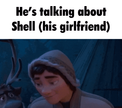 a man is talking to a reindeer while wearing a hat .