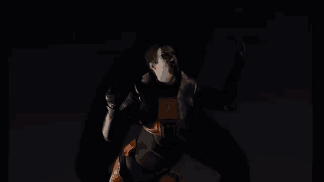 a man in a half life 2 costume is standing in the dark .