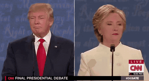 donald trump and hillary clinton are standing next to each other