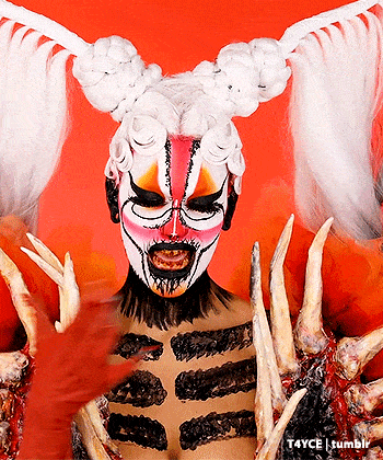 a person with a skeleton body painted on their body