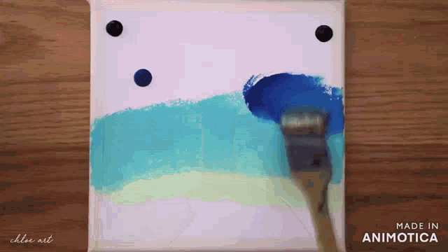a painting is being painted on a canvas with the words made in animatica on the bottom
