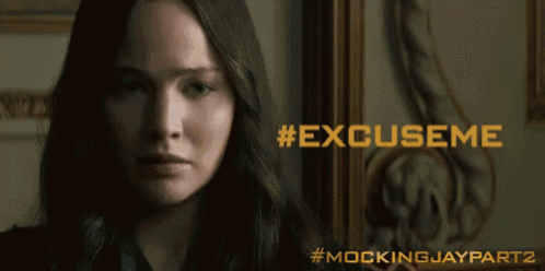 a poster for mockingjay part 2 shows a woman looking at the camera