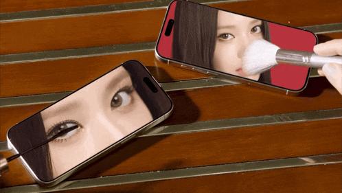 a phone with a picture of a woman on the screen