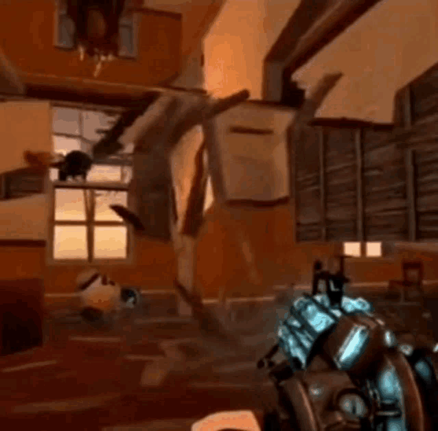 a person is playing a video game in a room with a clock on the wall .
