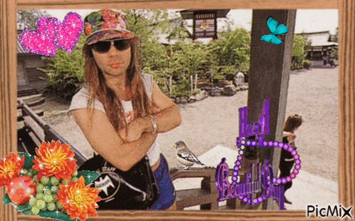 a picture of a man with his arms crossed is surrounded by flowers and a sign that says picmix on it