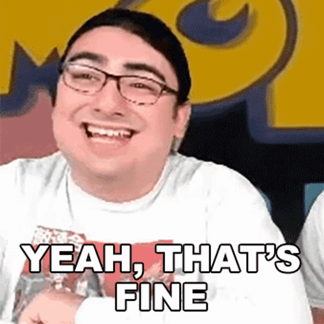 a man wearing glasses is smiling with the words yeah that 's fine below him