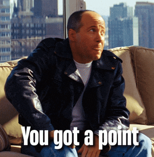 a man sitting on a couch with the words you got a point written below him